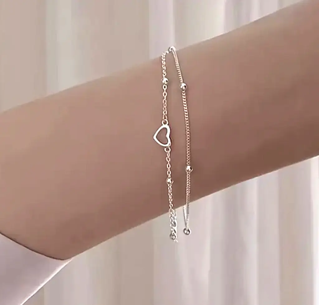 Brazalete de doble capa con forma de corazón 4.webp